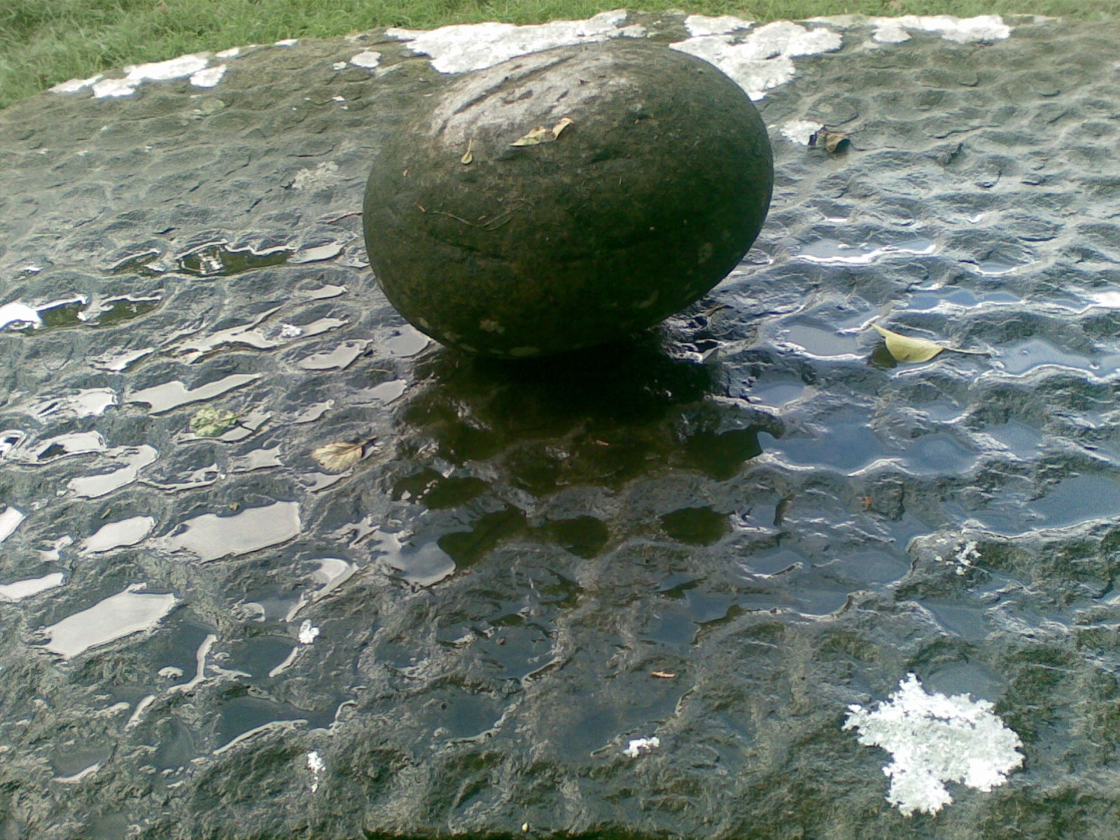 The Bullaun stone on the Altar at Lassair's Well