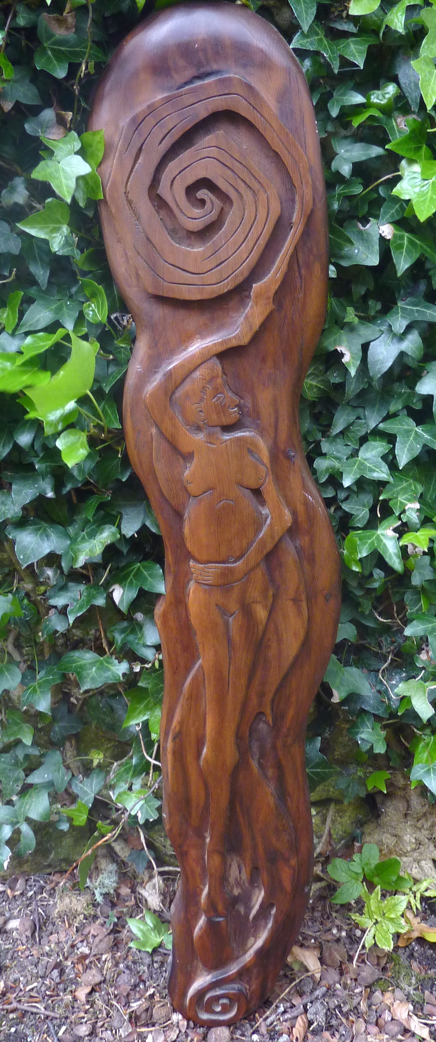 Macha - a sculpture in bog yew by Davy Paton